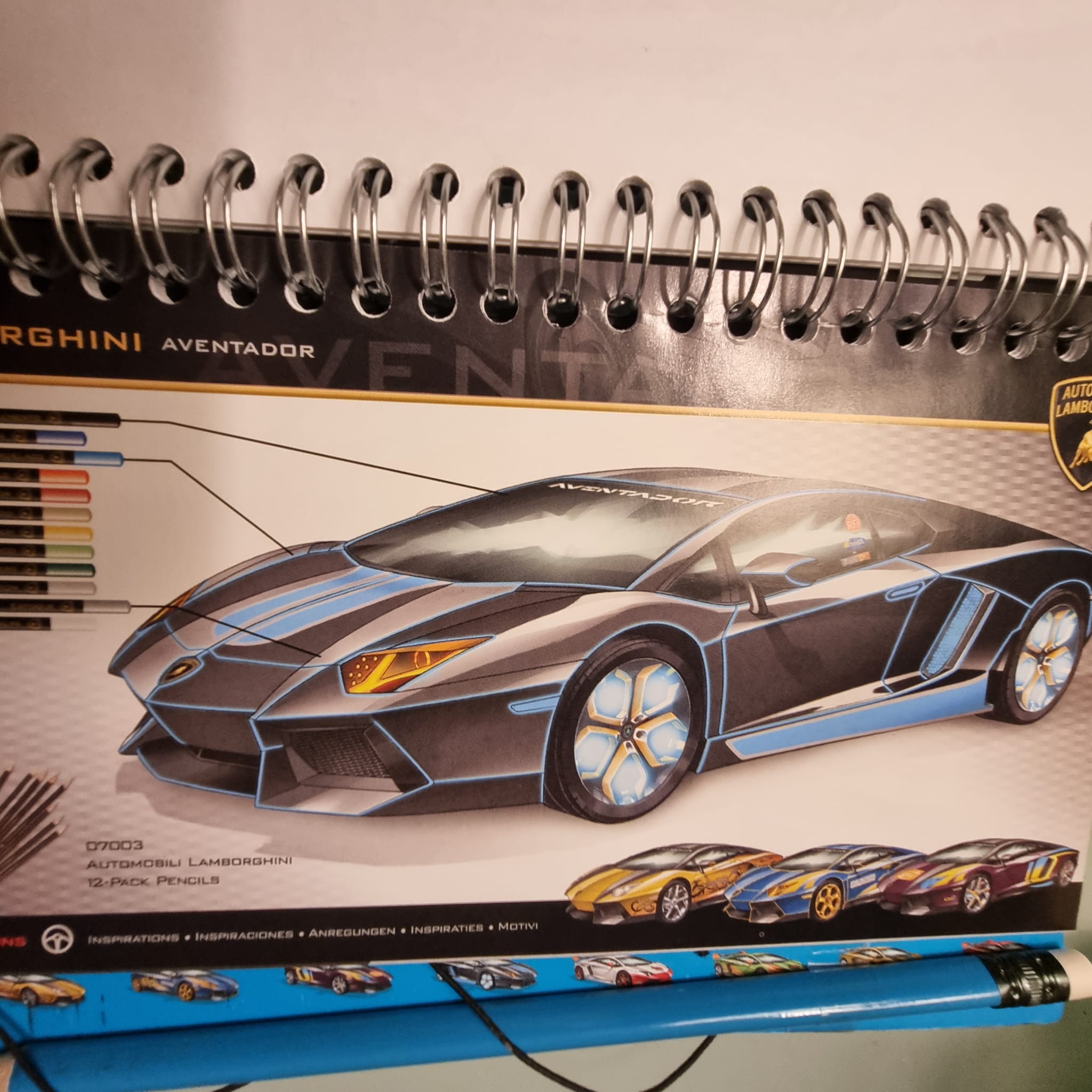 Lamborghini Aventador colouring and design book with a colour-in pencil set.