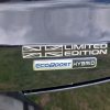 Ford car with "Limited Edition" Union Jack and "EcoBoost Hybrid" badges on the boot.